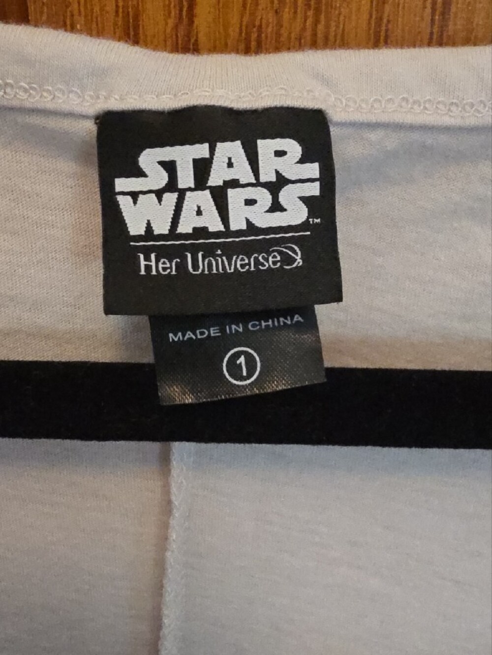 Star Wars White Tank Top with Red Rebel Emblem and Blue Lightsaber Graphic - Picture 3 of 3